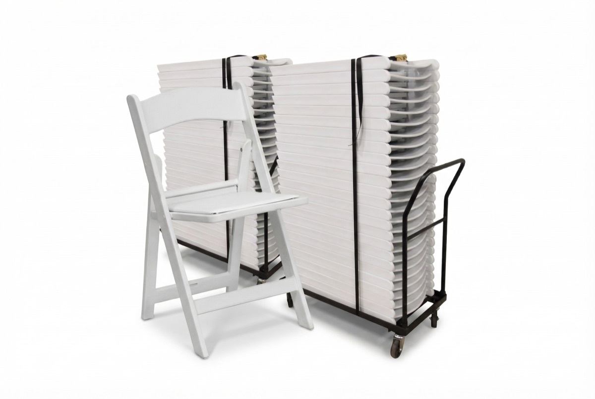 White banquet chairs stacked on a rolling dolly in the flagship space
